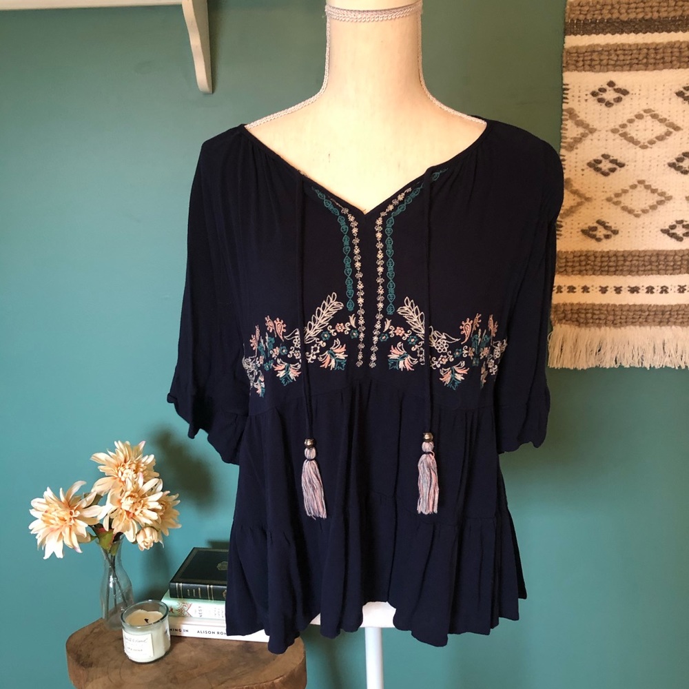 Navy blouse with embroidery and tassels